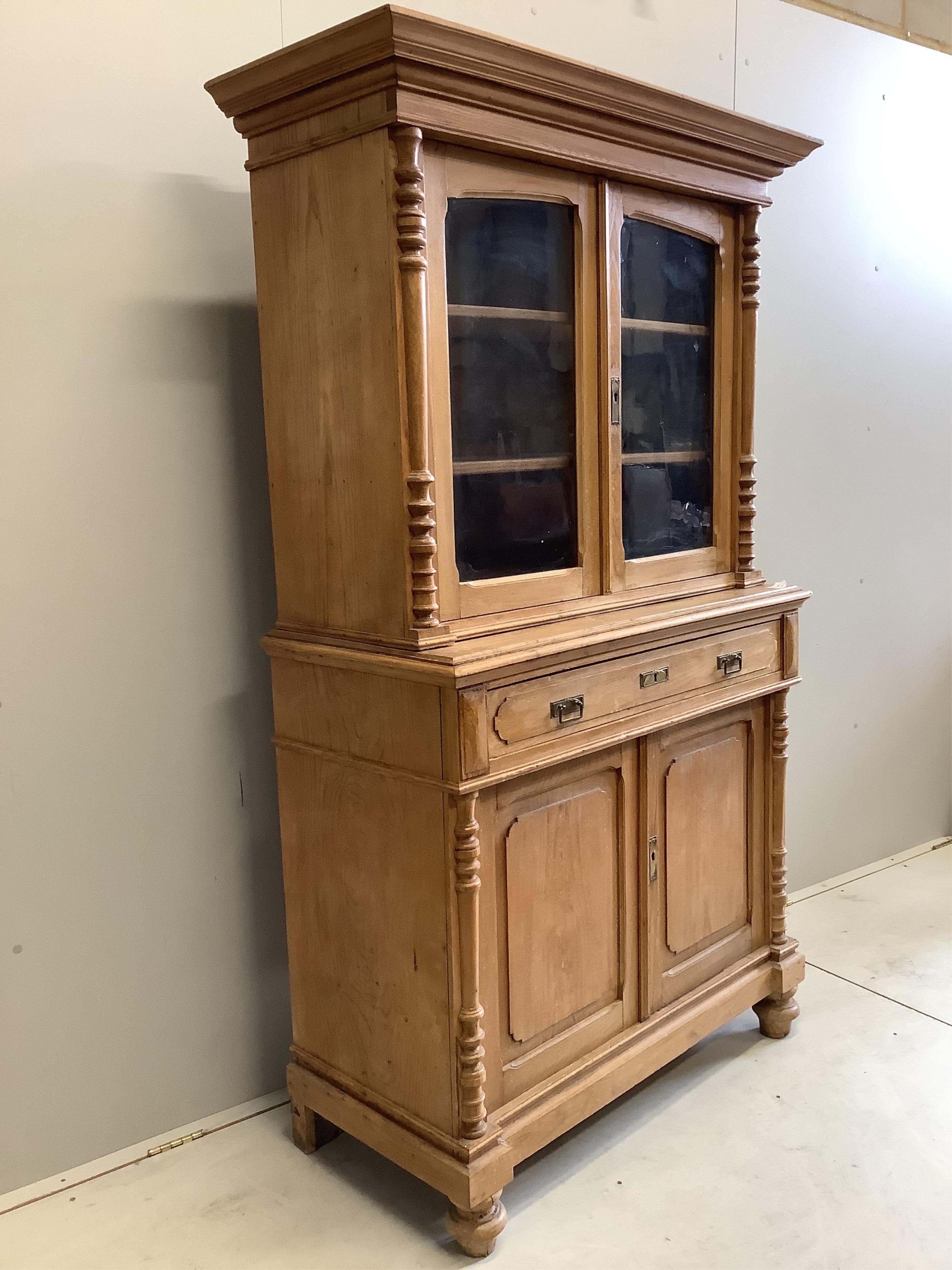 A late 19th century Belgian elm cupboard, width 115cm, depth 50cm, height 190cm